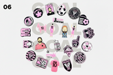 Collection of pink and black stickers with various designs on a white background.