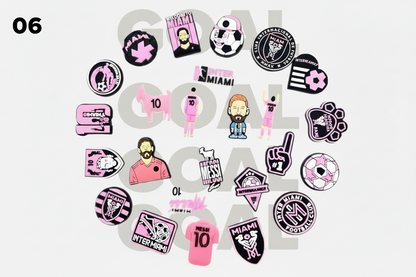 Collection of pink and black stickers with various designs on a white background.